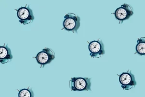 blue background with clocks all around