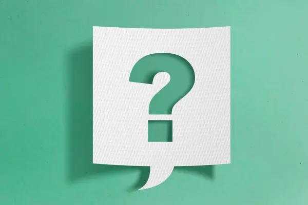 green and white question mark